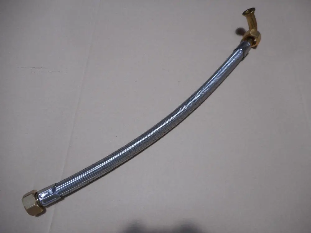 Verbindungsschlauch mit metallischer Umflechtung und zwei Anschlüssen, geeignet für Anwendungen, die von der Marke Remeha stammen.
